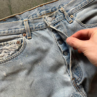 Vintage Levi's 501 Jeans Straight Leg Faded and Distressed Made in USA 31x34