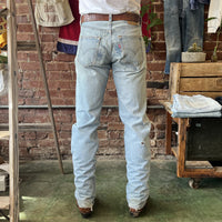 Vintage Levi's 501 Jeans Straight Leg Faded and Distressed Made in USA 31x34