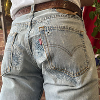 Vintage Levi's 501 Jeans Straight Leg Faded and Distressed Made in USA 31x34